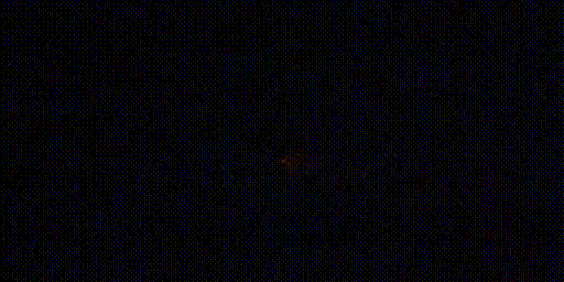 Slow motion video of an explosive charge detonating.